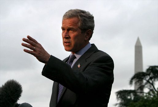 Departing the White House via Marine One, President George W. Bush talks with the media on the South Lawn Friday, May 16, 2003. White House photo by Paul Morse