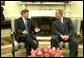 President George W. Bush meets with the Prime Minister Kjell Magne Bondevik of Norway in the Oval Office Friday, May 16, 2003. White House photo by Paul Morse