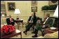 President George W. Bush meets with Senator John Danforth, the President's Special Envoy to the Sudan, center, and Secretary of State Colin Powell in the Oval Office Wednesday, May 21, 2003. White House photo by Susan Sterner.