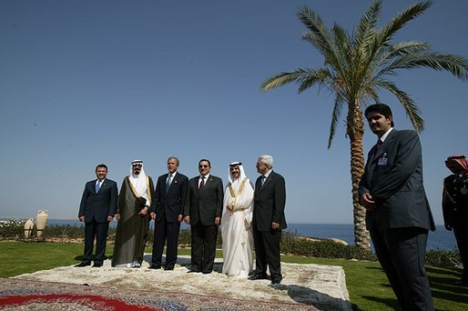 Red Sea Summit participants from left King Abdullah Bin Al Hussein of Jordan, Prince Abdullah Bin Abd Al Aziz of Saudi Arabia, President George W. Bush, President Hosni Mubarak of Egypt, King Hamad Bin Issa Al Khalifa of Bahrain, and Prime Minister Mahmoud Abbas from the Palestinian Delegation pose for a family photo next to the Red Sea in Sharm El Sheikh, Egypt June 3, 2003. White House photo by Paul Morse.