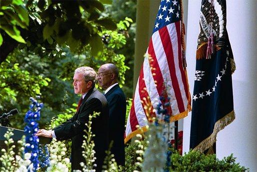 President George W. Bush and Secretary of Education Rod Paige discuss the progress of the No Child Left Behind Act in the Rose Garden Tuesday, June 10, 2003. "(The Act) requires every state in our country to submit an accountability plan that leads to measurable gains in student performance," said the President. "As of today, all of the states, plus Puerto Rico and the District of Columbia, have now submitted those plans." White House photo by Susan Sterner