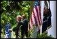 President George W. Bush and Secretary of Education Rod Paige discuss the progress of the No Child Left Behind Act in the Rose Garden Tuesday, June 10, 2003. "(The Act) requires every state in our country to submit an accountability plan that leads to measurable gains in student performance," said the President. "As of today, all of the states, plus Puerto Rico and the District of Columbia, have now submitted those plans." White House photo by Susan Sterner