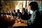 President George W. Bush answers questions from reporters before a bipartisan meeting with senators on Medicare reform in the Cabinet Room Wednesday, June 18, 2003. White House photo by Paul Morse