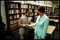 Laura Bush meets a student as she tours the library of Dimner Beeber Middle School in Philadelphia, Pa., June 25, 2003. White House photo by Tina Hager