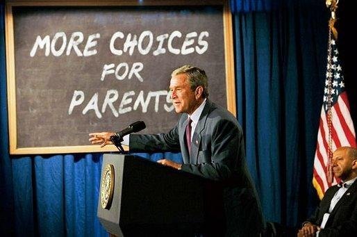 President George W. Bush discusses education as Mayor Anthony William and Education Secretary Rod Paige (not pictured) listen at KIPP D.C. Key Academy, a charter school, in Washington, D.C., July 1, 2003. White House photo by Tina Hager