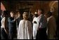 President George W. Bush and Laura Bush tour the Slave House on Goree Island, Senegal, with President Abdoulaye Wade and Viviane Wade of Senegal, Secretary of State Colin Powell, far left, and National Security Advisor Dr. Condoleezza Rice Tuesday, July 8, 2003. White House photo by Paul Morse.