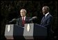 Presidents Bush and Mbeki speak to the media at the Guest House in Pretoria, South Africa, Wednesday, July 9, 2003. “I must say, President (Bush), that at the end of these discussions, we, all of us, feel enormously strengthened by your very, very firm and clear commitment to assist us to meet the challenges that we've got to meet domestically and on the African continent,” said President Mbeki. White House photo by Paul Morse