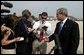 President George W. Bush discusses the death of entertainer with the press Bob Hope as he boards Air Force One July 28, 2003. "Today America lost a great citizen. We mourn the passing of Bob Hope. Bob Hope made us laugh, and he lifted our spirits. Bob Hope served our nation when he went to battlefields to entertain thousands of troops from different generations," said the President. White House photo by Paul Morse.