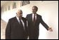 President George W. Bush and Israeli Prime Minister Ariel Sharon walk through the Rose Garden colonnade after their joint press conference Tuesday, July 29, 2003. White House photo by Paul Morse.