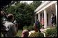 President George W. Bush addresses the media during a Rose Garden news conference Wednesday, July 30, 2003. President Bush discussed many topics including progress in Iraq, the Middle East, and the economy. White House photo by Paul Morse