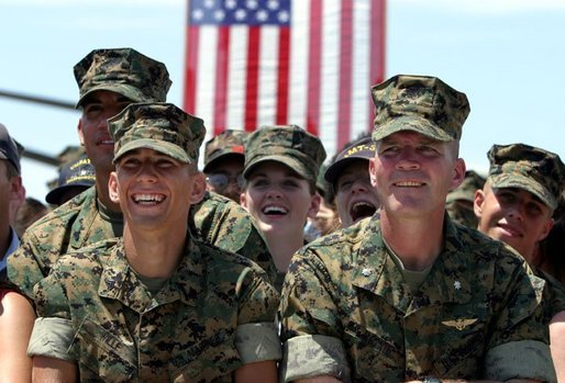 Marines react to remarks by President George W. Bush to military personnel and their families at Marine Air Corps Station Miramar near San Diego, CA on August 14, 2003. White House photo by Paul Morse.