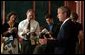 President George W. Bush speaks to reporters while in San Diego, CA on the power outage that effected a large part of east coast on August 14, 2003. White House photo by Paul Morse.