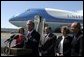 President George W. Bush talks with the media after stopping in Seattle, Wash., Friday, August 22, 2003. President Bush discussed a range of issues including his tax plan, the fires in Oregon, Iraq, and the Middle East. White House photo by Paul Morse.