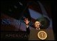 President George W. Bush addresses the 85th Annual American Legion Convention in St. Louis, Mo., Tuesday, Aug. 26, 2003. "In the 20th century, the American flag and the American uniform stood for something unique in history," President Bush said in his remarks. "America's armed forces humbled tyrants and raised up and befriended nations that once fought against us." White House photo by Paul Morse.