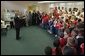 President George W. Bush is greeted by students at Hyde Park Elementary School in Jacksonville, Fla., Tuesday, Sept. 9, 2003. White House photo by Tina Hager