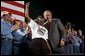 Receiving an enthusiastic welcome, President George W. Bush visits Detroit Edison's Monroe Power Plant in Monroe, Mich., Monday, Sept. 15, 2003. White House photo by Tina Hager.