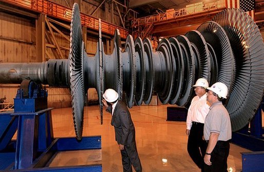 President George W. Bush tours the Detroit Edison's Monroe Power Plant in Monroe, Mich., Monday, Sept. 15, 2003. At the plant, the President viewed modernizing efforts and discussed how the administration is improving New Source Review regulations. The changes will provide increased flexibility and ensure that air pollution will not be increased when plants maintain and replace worn-out equipment. White House photo by Tina Hager.