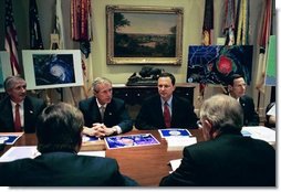 President George W. Bush receives a briefing on Hurricane Isabel in the Roosevelt Room Wednesday, Sept. 17, 2003. White House photo by Paul Morse