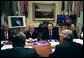 President George W. Bush receives a briefing on Hurricane Isabel in the Roosevelt Room Wednesday, Sept. 17, 2003. White House photo by Paul Morse