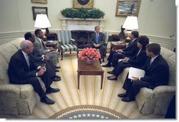 President George W. Bush discusses faith-based administrative reforms with Cabinet Members in the Oval Office Monday, Sept. 22, 2003. They are, from left, Deputy Secretary of Education Eugene Hickok, Deputy Secretary of Veterans Affairs Leo Mackay, Deputy Secretary of Health and Human Services Claude Allen, Secretary of Housing and Urban Development Mel Martinez, Secretary of Labor Elaine Chao, and Director of USA Freedom Corps John Bridgeland.  White House photo by Eric Draper