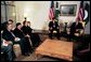 President George W. Bush talks with President Pervez Musharraf of Pakistan during a series of United Nations meetings with world leaders in New York Wednesday, Sept. 24, 2003. White House photo by Paul Morse.