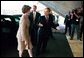 Laura Bush is welcomed to UNESCO headquarters in Paris by UNESCO director Koichiro Matsuura for formal ceremonies celebrating the renewed participation of the United States Sept. 9, 2003. White House photo by Susan Sterner