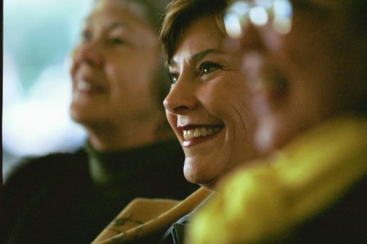 Laura Bush enjoys presentations by authors during the 2003 National Book Festival on the National Mall in Washington, D.C., Oct. 4, 2003. White House photo by Susan Sterner