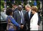 President George W. Bush and Mrs. Laura Bush welcome President Mwai Kibaki and Mrs. Kibaki of the Republic of Kenya to the White House Monday, October 5, 2003. White House photo by Eric Draper