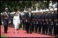 President George W. Bush and Philippine president Gloria Arroyo review troops during a welcoming ceremony at Malacanang Palace in Manila, Philippines, Saturday, Oct. 18, 2003. White House photo by Paul Morse