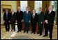 President George W. Bush meets with six of the 2003 recipients of the Nobel Awards in the Oval Office Monday, November 17, 2003. From left to right, Nobel Award recipients are: Dr. Rokerick MacKinnon, New York City (chemistry); Dr. Anthony Leggett, Urbana, Illinois (physics); Dr. Robert Engle, New York City (economics); Dr. Alexei Abrikosov, Argonne, Illinois (physics); Dr. Peter Agre, Baltimore, Maryland (chemistry); and Dr. Paul Lauterbur, Urbana, Illinois (physiology/medicine). White House photo by Tina Hager