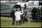 President George W. Bush and Mrs. Laura Bush arrive at Prime Minister Tony Blair and Mrs. Blair’s home, Myrobella House, Trimdon Station. White House photo by Eric Draper.