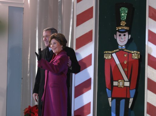 President George W. Bush and Mrs. Laura Bush arrive at the Pageant of Peace to light the National Christmas Tree at the Ellipse in Washington DC on Thursday December 4, 2003. White House photo by Paul Morse.