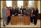 President George W. Bush signs H. R. 3491, the National Museum of African-American History and Culture Act, in the Oval Office Tuesday, Dec. 16, 2003. The act authorizes the creation of a Smithsonian Institution museum dedicated to the legacy of African Americans in America. White House photo by Paul Morse.