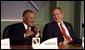 President George W. Bush talks with the Prime Minister Owen Arthur of Barbados during the inaugural ceremony of the Special Summit of the Americas in Monterrey, Mexico, Jan. 12, 2004. White House photo by Paul Morse