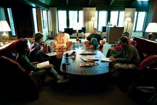 During a weekend meeting with his advisors at Camp David, President George W. Bush prepares his State of the Union speech Jan. 17, 2004. White House photo by Eric Draper