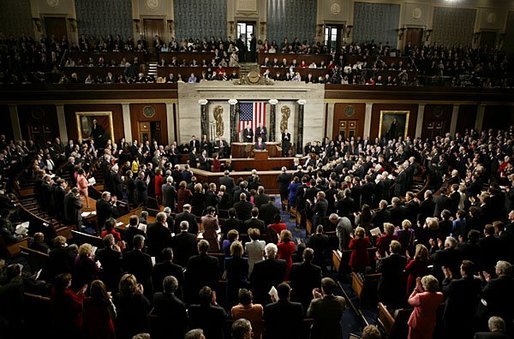 President George W. Bush delivers his State of the Union Address to the nation and a joint session of Congress in the House Chamber of the U.S. Capitol Tuesday, Jan. 20, 2004. "We must continue to pursue an aggressive, pro-growth economic agenda. Congress has some unfinished business on the issue of taxes," said the President, calling on Congress to make the tax cuts permanent. White House photo by Paul Morse