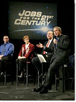 President George W. Bush speaks with participants during a discussion on job training and the economy at Owens Community College in Perrysburg Township, Ohio, Wednesday, Jan. 21, 2004.  White House photo by Eric Draper