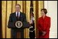 President George W. Bush and Laura Bush talk about heart disease as the number-one killer of all Americans during White House ceremonies to launch American Heart Month Monday, Feb. 2, 2004. The event, part of the national Heart Truth campaign, was held to highlight the issue of heart disease and women. White House photo by Susan Sterner