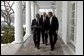 President George W. Bush and United Nations Secretary General Kofi Annan walk with Secretary of State Colin Powell along the colonnade in the Rose Garden at the White House Tuesday, Feb. 3, 2004. White House photo by Paul Morse