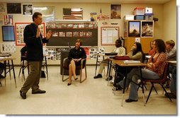 Laura Bush attends a classroom discussion with Mr. David Chapman’s history students at Bentonville High School in Bentonville, Ark., Tuesday, Feb. 17, 2004. "Teaching is one of the most difficult jobs, but it's also the most rewarding. What you do in the classroom determines your children's future and the future of our country," said Mrs. Bush in her remarks about education.  White House photo by Tina Hager