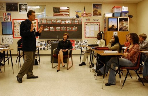 Laura Bush attends a classroom discussion with Mr. David Chapman’s history students at Bentonville High School in Bentonville, Ark., Tuesday, Feb. 17, 2004. "Teaching is one of the most difficult jobs, but it's also the most rewarding. What you do in the classroom determines your children's future and the future of our country," said Mrs. Bush in her remarks about education. White House photo by Tina Hager