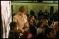 Laura Bush is greeted by students at Limerick Elementary School in Los Angeles, California, Wednesday, February 18, 2004. White House photo by Tina Hager