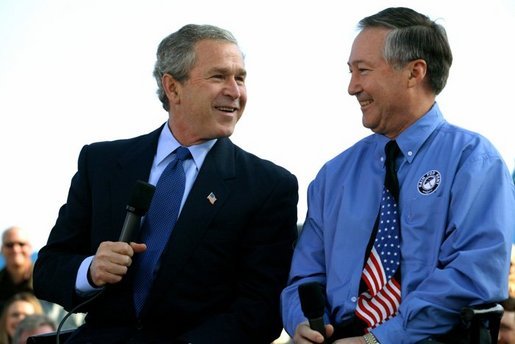 President George W. Bush talks with Rain for Rent President John Lake during a Conversation on the Economy at Rain for Rent in Bakersfield, Calif., Thursday, March 3, 2004. White House photo by Eric Draper