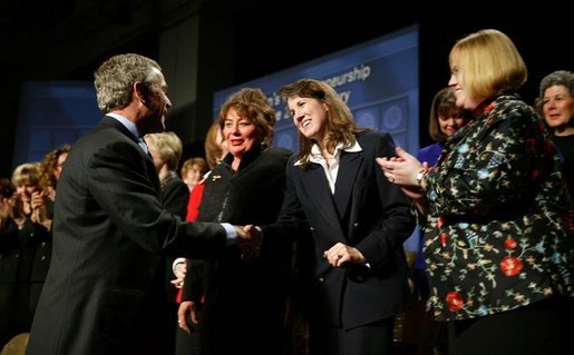 President George W. Bush greets participants at the Women's Entrepreneurship in the 21st Century Forum in Cleveland, Ohio, Wednesday, March 10, 2004. White House photo by Paul Morse