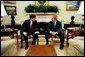 President George W. Bush meets with Prime Minister of the Netherlands Jan Peter Balkenende in the Oval office. Tuesday, March 16, 2004. White House photo by Tina Hager