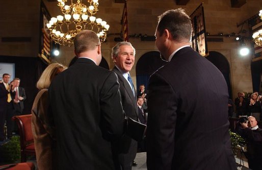 President George W. Bush greets participates in the President's conversation about health access at the U.S. Chamber of Commerce Tuesday, March 16, 2004. White House photo by Tina Hager