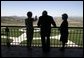 Looking over a replica of the White House South Lawn, former First Lady Nancy Reagan leads Vice President Dick Cheney and Mrs. Lynne Cheney on a tour of the Ronald Reagan Presidential Library and Museum in Simi Valley, Calif., Wednesday, March 17, 2004. White House photo by David Bohrer.