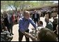 President George W. Bush greets the audience following his remarks about homeownership at Expo New Mexico in Albuquerque, N.M., Friday, March 26, 2004. White House photo by Eric Draper