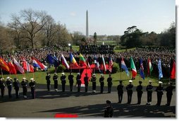 President George W. Bush addresses a crowd gathered on the South Lawn to celebrate the induction of seven countries into NATO Monday, March 29, 2004. The countries acceding to the alliance are Latvia, Slovenia, Lithuania, the Slovak Republic, Romania, Bulgaria and Estonia.  White House photo by Susan Sterner