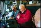 Vice President Dick Cheney talks with WLW-AM radio hosts after throwing out the first pitch on opening day in Cincinnati, Ohio at the Red's Great American Ballpark on April 5, 2004. White House photo by David Bohrer